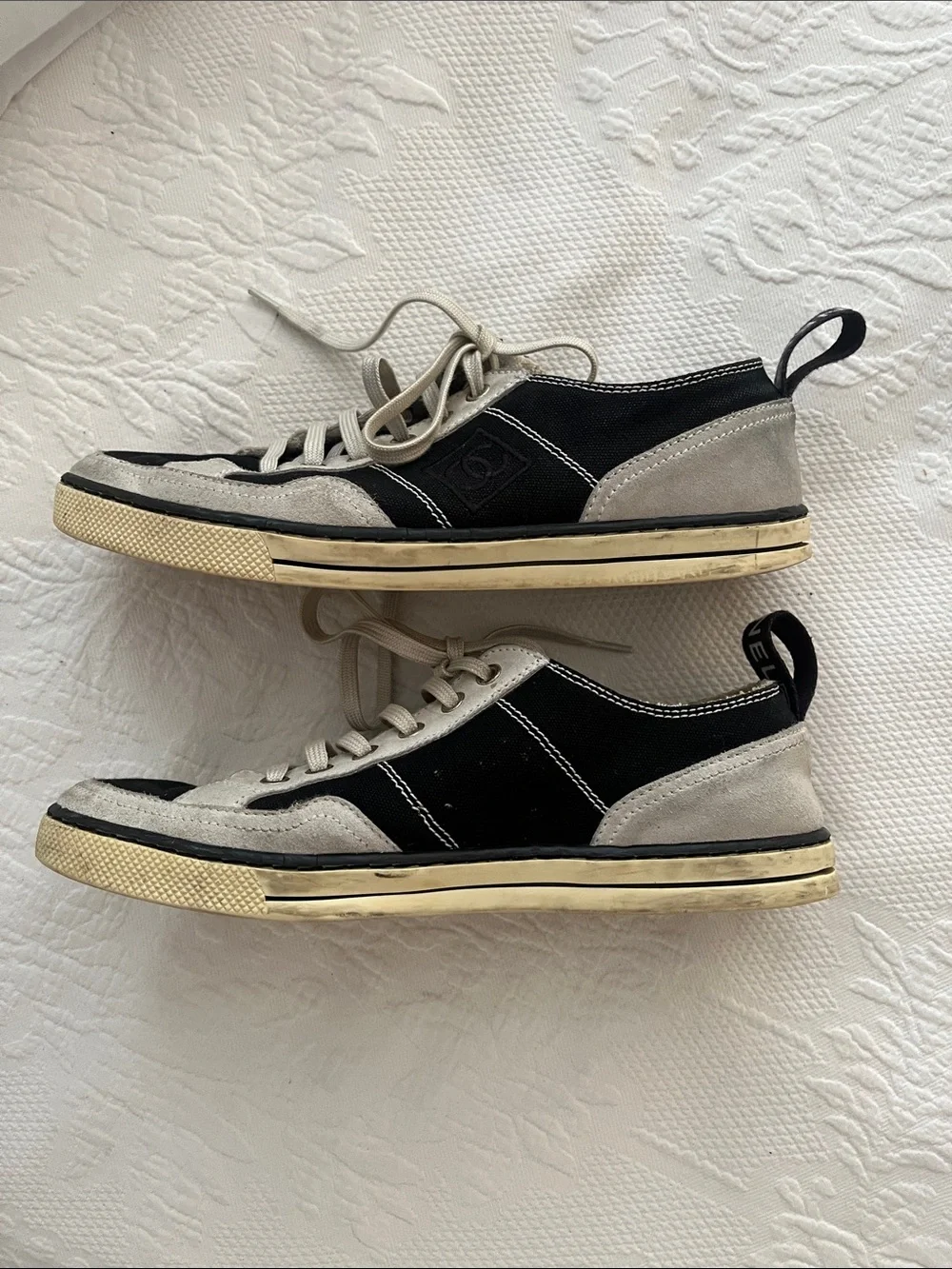 Chanel Women’s Black and Cream Lace-Up Sneakers